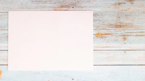 Drawing tools appear on wooden table - Art concept stop motion flay lay Stock-Footage 128931536