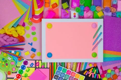 Drawing tools on pink backdrop. Glamour coral pink fairytale style. Stationer Stock Photos