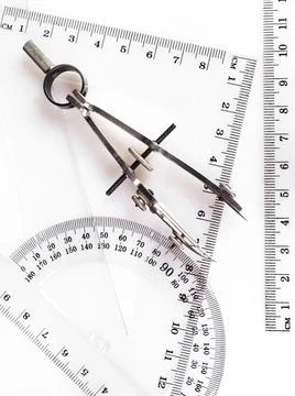 Drawing tools, school stationery. Ruling pen on white. Stock Photos
