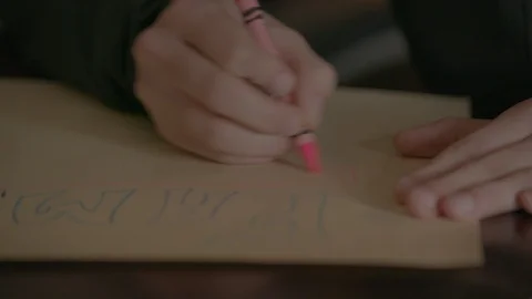 Drawing using a pink crayon 1 Stock Footage 103864820