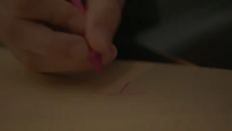 Drawing using a pink crayon 2 Stock Footage 103865201