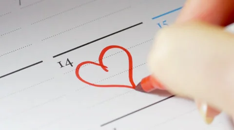 Drawing valentine heart on 14th February on calendar Stock Footage