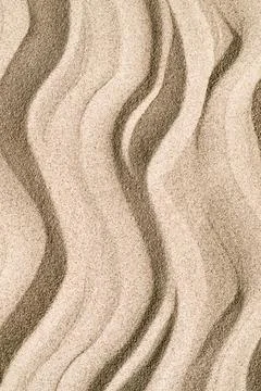 Drawing of waves on the sand on the beach, sand pattern Foto stock