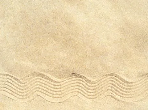 Drawing of waves on the sand on the beach, sand pattern Stock Photos