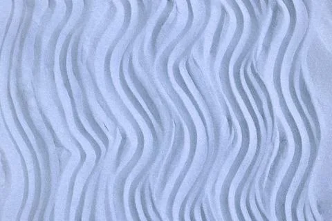 Drawing of waves on the sand on the beach, sand pattern Stock Photos