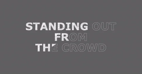 Drawing a word STANDING OUT FROM THE CROWD 스톡 동영상 60491621