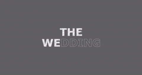 Drawing a word THE WEDDING Stock Footage 60577408