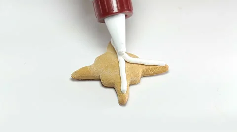 Drawing on xmas star gingerbread Stock Footage 36003797