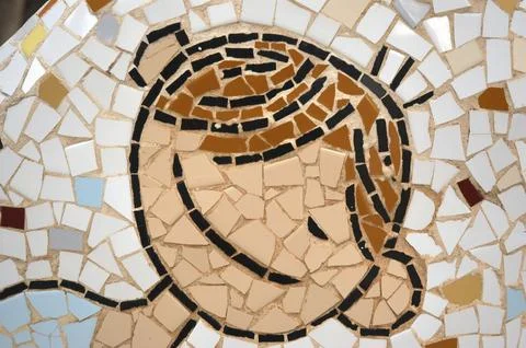 Drawings of children's faces made up of small pieces of tile Stock Photos