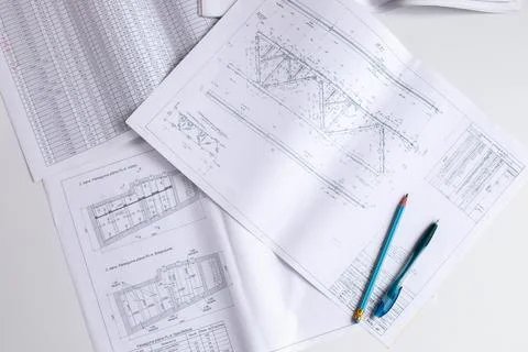 Drawings of a construction engineer on a sheet of paper Stock Photos