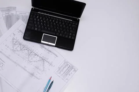 Drawings of a construction engineer on a sheet of paper Stock Photos
