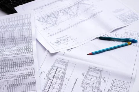Drawings of a construction engineer on a sheet of paper Stock Photos