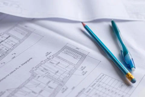Drawings of a construction engineer on a sheet of paper Stock Photos