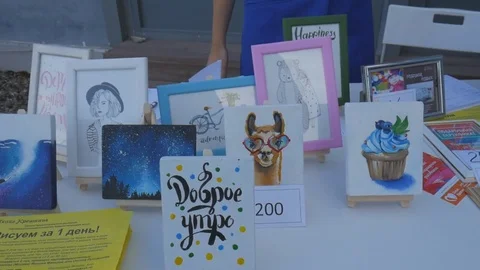 The drawings exhibited on the table Stock Footage 81897236