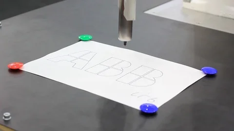 Drawings of straight lines on paper using technology, a special robot. 库存影片 120292274