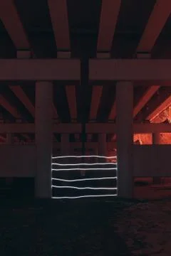 Drawn by the light under the post of the barrier between two pillars Stock Photos