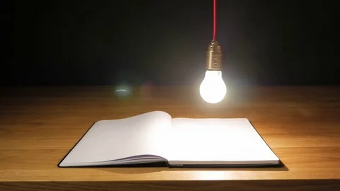Drawn lightbulb is turning real Video stock 82536922