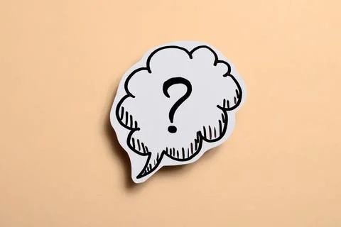 Drawn question mark on a beige background Foto stock