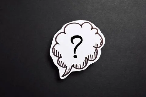 Drawn question mark on a black background Stock Photos