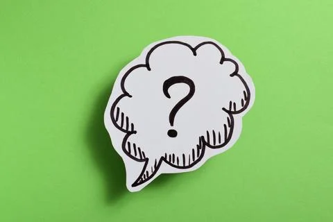 Drawn question mark on a green background Stock Photos