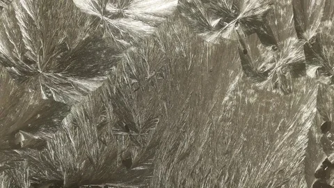 Draws frost patterns on a window. Stock Footage 121191370