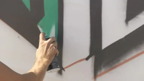 Draws graffiti paint from the container Stock-Footage 114294595
