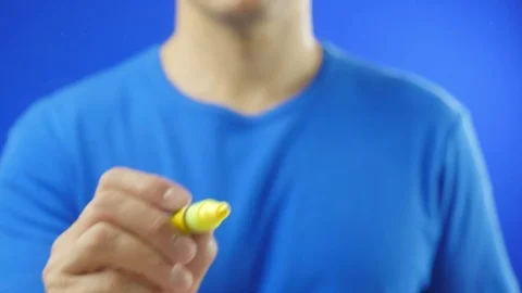 Draws sun. Close up. Stock Footage 70692055