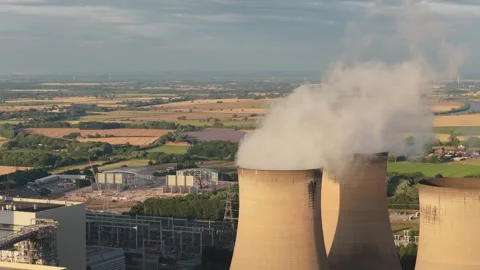Drax Power Station Cooling Towers Releasing Steam Under a Clear Sky During the Stock Footage 343885128