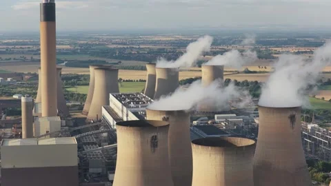 Drax Power Station Producing Steam From Cooling Towers on a Bright Sunny Stock Footage 343884663