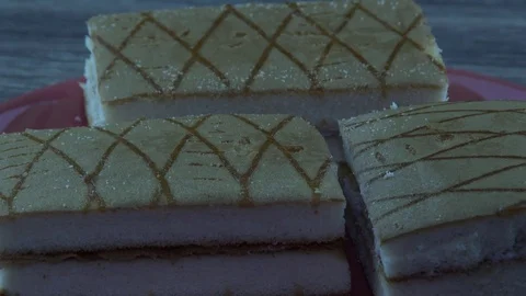 Dray cakes on red palte Stock Footage 82852917