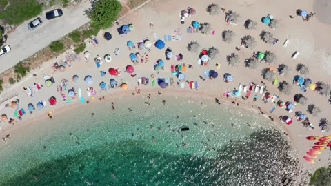Dream beach overhead top down drone shot. Crystal clear water Stock Footage 249013117