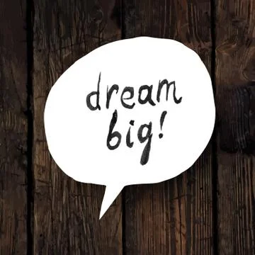 "Dream big" lettering in speech bubble on wooden texture Illustration