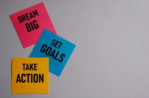 DREAM BIG SET GOALS TAKE ACTION. Motivational quote Stock Photos