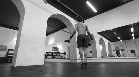Dream big work hard. Low angle monochrome shot of a professional fighter exer Stock Footage 58556440