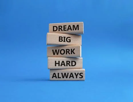 DREAM BIG WORK HARD symbol. Wooden blocks with words DREAM BIG WORK HARD AL.. Stock Photos