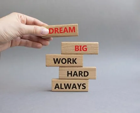 DREAM BIG WORK HARD symbol. Wooden blocks with words DREAM BIG WORK HARD ALWA Stock Photos