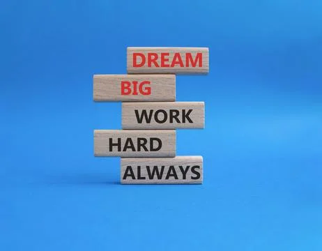 DREAM BIG WORK HARD symbol. Wooden blocks with words DREAM BIG WORK HARD AL.. Stock Photos