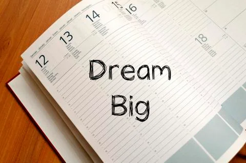 Dream big write on notebook Stock Photos
