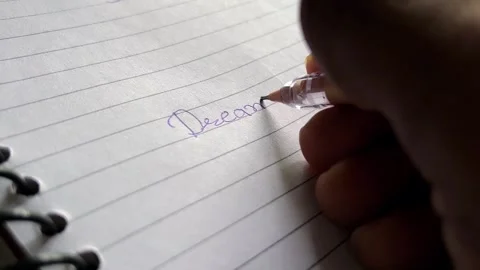 Dream Big Written on Notebook Page with Blue Pen Stockbeeldmateriaal 320213241