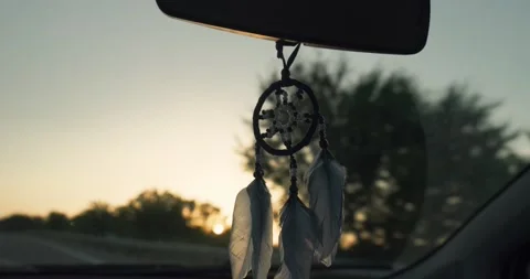 Dream catcher hanging inside car on a back view mirror. Stock Footage 158323321