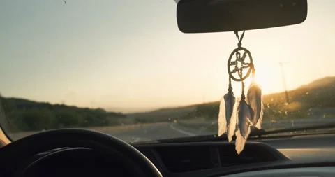 Dream catcher hanging inside car on a back view mirror. Stock Footage 158324887