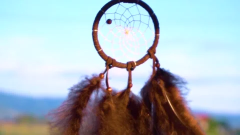 Dream Catcher Hanging From Rear view Mirror Inside Car waving in the wind 스톡 동영상 150573305