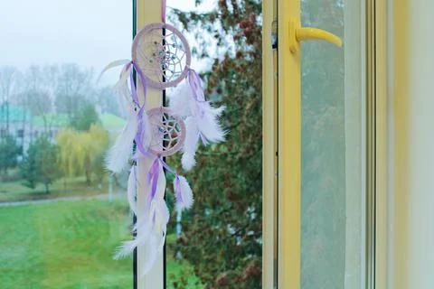Dream catcher on an open window Stock Photos