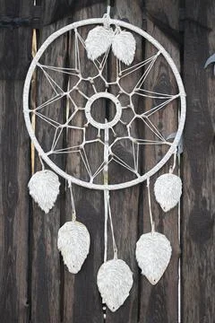 Dream catcher on rustic background Stock Photos