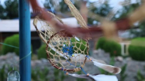Dream catchers develop in the wind against the backdrop of the beach. A lot of s Stock Footage 116617376