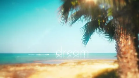 DREAM Text Floating on Ocean Water, Aspirational Tropical Beach Motion Graphic. Stock Footage 320041093