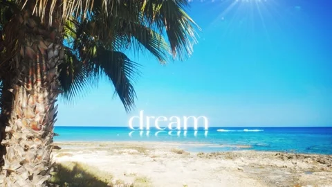 DREAM Text Floating on Ocean Water, Aspirational Tropical Beach Motion Graphic. Stock Footage 320070421