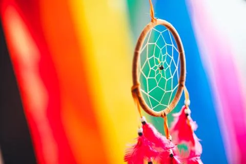 Dreamcatcher on the background of rainbow flag Stock Photos