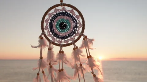 Dreamcatcher golden disk sun boho style slow motion close up Stock Footage 292544541