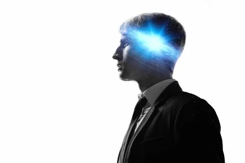 Dreamer, creative mind concept. A man with a galaxy in his head, Stock-Fotos